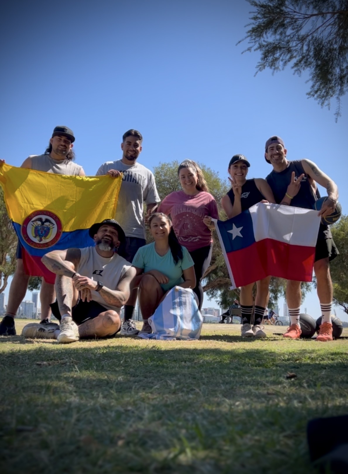 Diverse EZ Community members training together outdoors