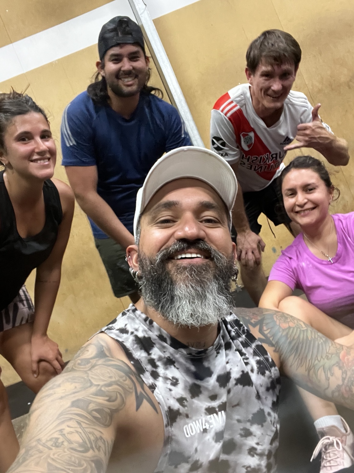 Jotik Serje smiling with current EZ Classes members in Perth after training