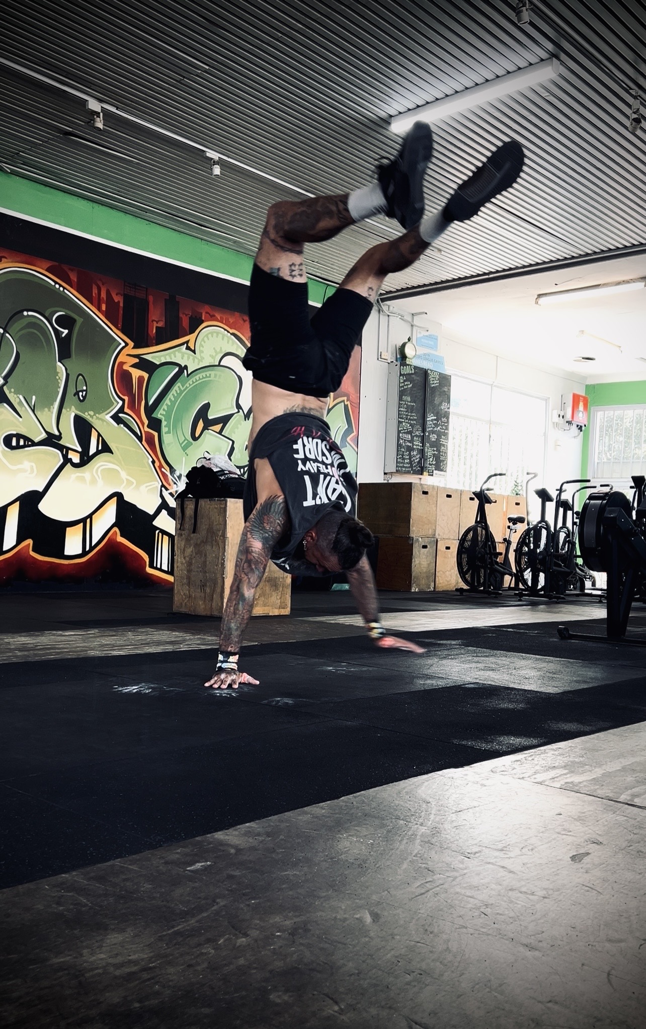 Jotik Serje practising a handstand walk during training